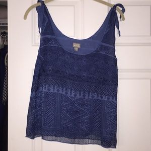 Blue tank with tie shoulders for adjusting
